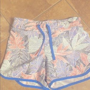 Columbia board shorts. Blue piping detail.